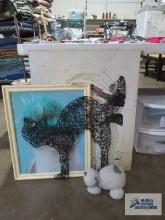 Variety of cat wall hangings and cat figurine