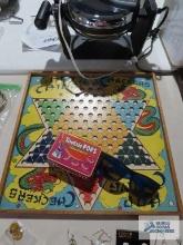 Chinese checkers board, children's sunglasses and Tootsie Pops Miniatures tin with game