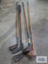 Antique wooden golf clubs