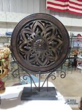 Metal decoration on stand