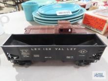 Lionel coal car number 6476 and Lionel caboose number 6017