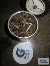 Assorted brass in container