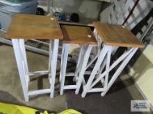 Three wood plant stands