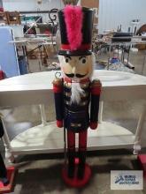 Wooden soldier nutcracker, approximately 4 ft tall.