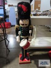 Wooden nutcracker with drum, approximately 3 ft tall