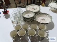 We can build a snowman stoneware made in China 8 plates, bowls, mugs, 7 glasses and 2 serving bowls.