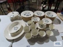 Homer Laughlin China with gold trim and white rose pattern. Service for 11 with extra pieces and