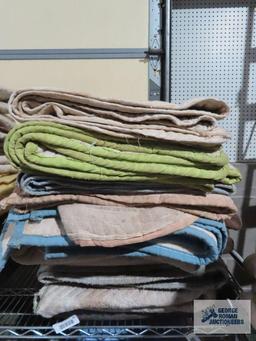 Ten assorted furniture moving blankets