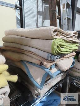 Ten assorted furniture moving blankets