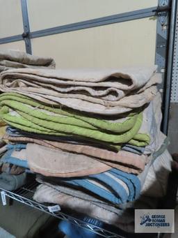 Ten assorted furniture moving blankets