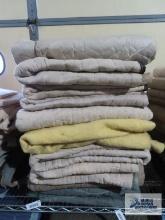 Ten assorted furniture moving blankets