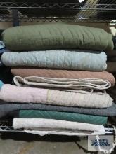 Ten assorted furniture moving blankets
