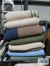 Eight assorted furniture moving blankets