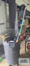 Lawn and garden tools including roll about trash can