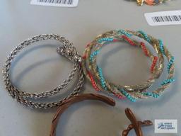 Copper colored cuff bracelets, beaded bracelets, and others