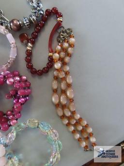 Beaded bracelets.