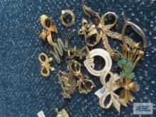 Gold colored ribbon and other pins by Colliet, France, Roman