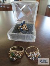 Three gemstone rings, 18K H G.E