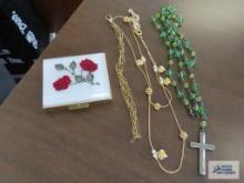 Rose motif vintage pill box, pocket watch fob, rosary, and eyeglass holder