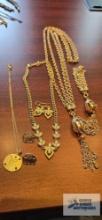 Necklace and earrings sets and one necklace and bracelet set