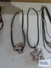 Costume jewelry necklaces and extra pendants