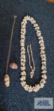 Seashell necklaces and pin