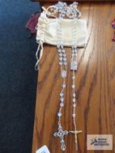 Two clear iridescent stone rosaries marked Italy