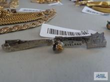 Baltimore versus Cleveland 1964 tie clip, other tie clip, and pin