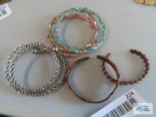 Copper colored cuff bracelets, beaded bracelets, and others