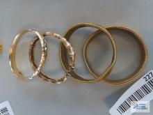 Gold colored bracelets