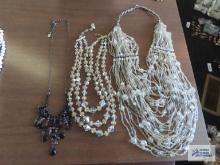 Vintage multi strand beaded necklaces and one single strand beaded necklace marked 1928