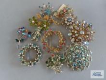 Variety of colorful gemstone pins