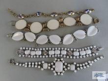 Variety of white stone and other bracelets