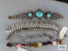 Variety of stone and silver necklaces, one is Coro