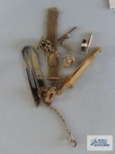 Tie tacks, clips, and etc