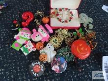 Variety of holiday pins and New Kids on the Block magnet
