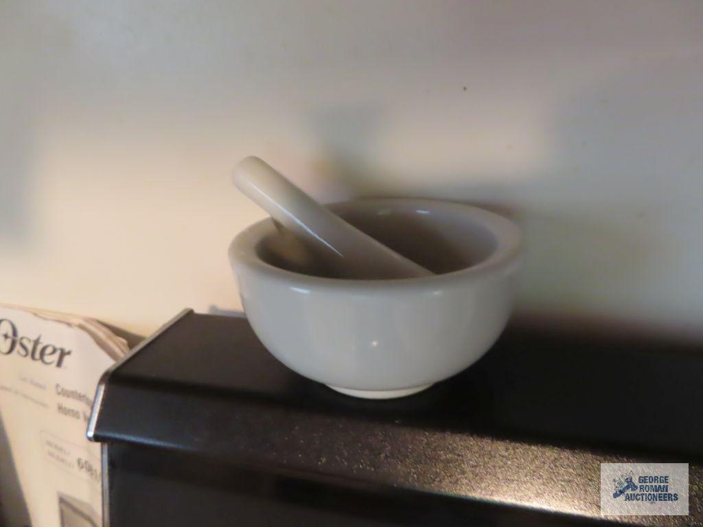 Salt and pepper grinders, paper baking cups, cookie cutters, wooden utensils, etc