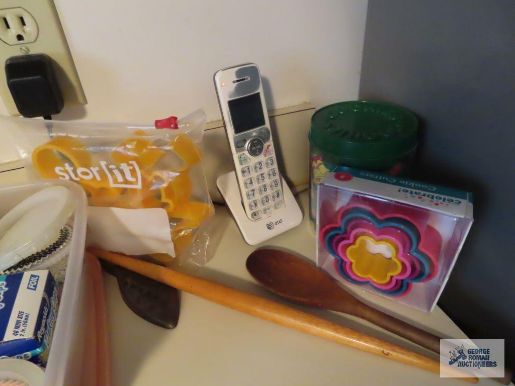Salt and pepper grinders, paper baking cups, cookie cutters, wooden utensils, etc