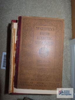 Antique books including McGuffey's 5th Eclectic Reader, Seven Centuries of Verse, and Modern