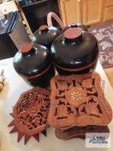 Wooden trivets and plastic canister set