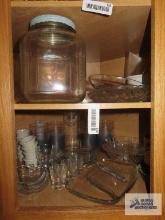 Assorted glassware including vintage biscuit jar