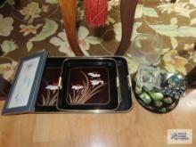 Plastic serving trays, woman with dress print, glass vase, etc