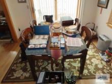 Formica top table with two extra leaves and four cherry finish chairs