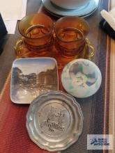Amber glass creamer and sugar with platter, Royal Copenhagen plate, Phillies 1975 ashtray, and art