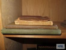 Books including The Wisdom of Oscar Wilde, Shakespeare's Julius Caesar, and Shakespeare's Macbeth