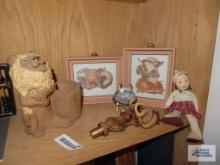 Plastic deer head decanter topper, miniature doll, ceramic lion planter, and squirrel wall art