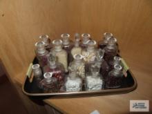 Variety of antique bottles and serving tray