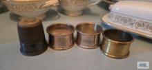 Sterling advertising thimble and Silverplate napkin rings. Thimble is approximately 2-1/2 inches