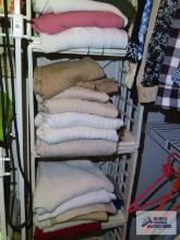 Variety of ladies sweaters and sweatshirts, mostly sizes petite medium and petite small