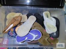 Variety of ladies flip flops and slides. mostly sizes 6 and 7